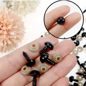 Plastic safety eyes with washers for plush toys, DIY craft accessories detailed view.