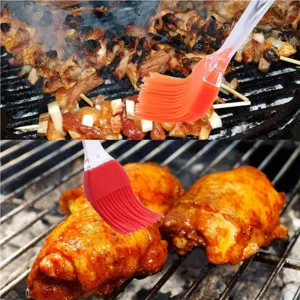 Silicone oil brush detail showing heat resistant bristles in use for barbecue and grilling.