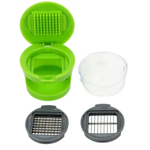 Manual garlic chopper with clear container and two blade inserts for quick food prep.