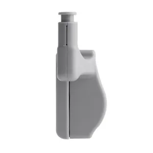Vue détaillée de l'amortisseur de charnière gris, accessoire tampon pour meuble de cuisine.