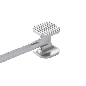 Detail view of small double-sided meat tenderizer hammer, aluminum alloy kitchen tool.
