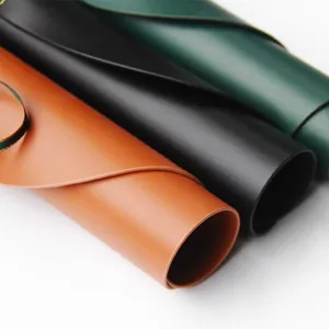 Rolled faux leather placemats set, waterproof and heat-resistant table mats for dining.