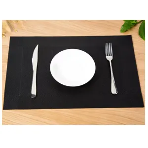 Set de table tissé en PVC noir tapis de table résistant à la chaleur pour cuisine.