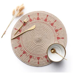 Runde gewebte Tischset mit rotem Druck, stilvolle Tischmatte zum Essen, wärmeisolierendes Design.