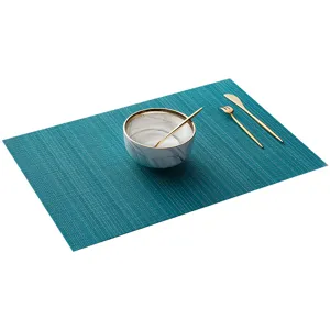Teal PVC woven placemat for dining table, modern heat-resistant table mat square table topper.