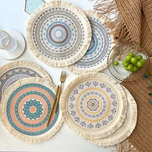 Nordic bohemian woven cotton placemat with fringe, round heat-resistant table pad decor.