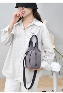 Casual nylon bucket crossbody bag for women, stylish small shoulder bag with drawstring.