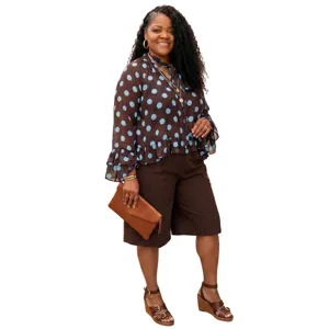 Plus size polka dot blouse and shorts set detail view, casual long sleeve top style.