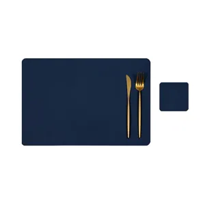 Set di tovagliette in pelle blu scuro con posate dorate e Sottobicchiere vista principale