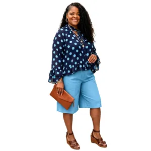 Polka dot long sleeve top with shorts detail view, plus size casual outfit showcase.