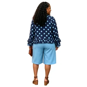 Plus size polka dot long sleeve top and culottes casual suit for women detail view.
