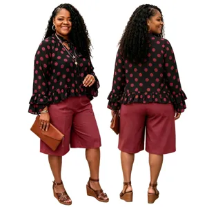 Plus size polka dot long sleeve blouse and shorts detail view, casual autumn wear.