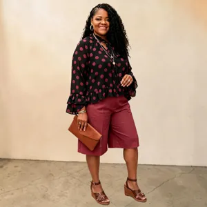 Detailed view of the women plus size polka dot long sleeve top and midi pants outfit.