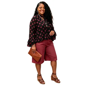 Plus-size polka dot long sleeve blouse and casual trousers outfit set apparel detail display