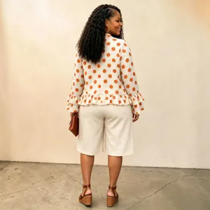 Plus size women's polka dot long sleeve top and matching shorts set, stylish casual fall outfit.