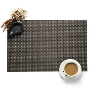 Cross-border PVC woven placemat, heat-insulating and waterproof rectangular table mat for dining.