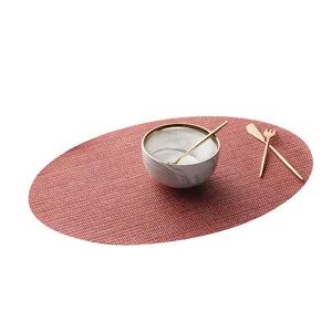 Oval PVC woven placemat heat insulation table mat for western dining room hotel decor red