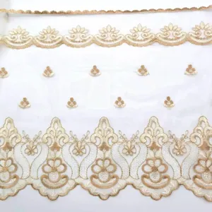 Exquisite gold embroidery lace trim detail, delicate floral pattern for DIY sewing projects.