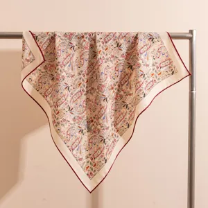 Luxury silk wool square scarf with vintage paisley print and hand-rolled edge for women.