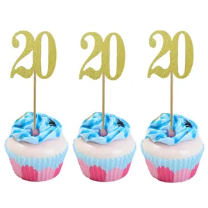 Detail shot of gold glitter number 20 cupcake toppers, perfect for birthday party decorations.