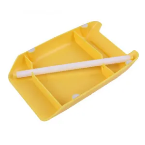 Yellow plastic pasta board and roller tool set for homemade gnocchi and macaroni maker.