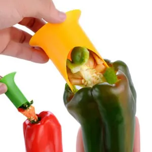 Handheld plastic bell pepper corer tool kitchen gadget for fast fruit seed remover and cutter.