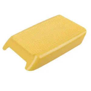 Yellow plastic gnocchi board and pasta maker tool detail, useful kitchen utensil for home cooking.