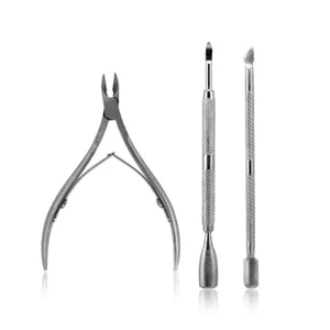 Stainless steel nail cuticle nipper and pusher tool set detail view for manicure care.