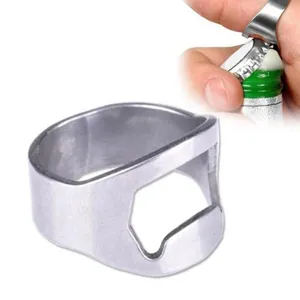 Stainless steel ring bottle opener detail showing finger wear and cap opening feature.