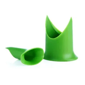 Green silicone vegetable pepper corer tomato core remover kitchen tool detail view.