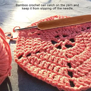 Carbonized bamboo crochet hook 2.0mm detail showing fine metal tip and ergonomic grip.