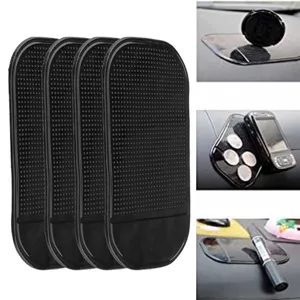 Black silicone car anti-slip dash mat, sticky phone holder pad for vehicle storage accessories.