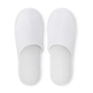 White closed-toe disposable hotel slippers, lightweight indoor home footwear for travel.
