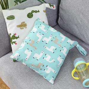 Portable baby diaper storage hanging bag with cute cactus and alpaca print designs.