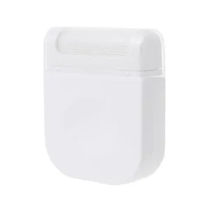 Detail view of portable manual fabric shaver, compact white lint remover for sweaters.