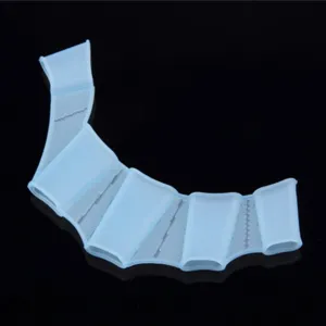 Detailed view of the silicone swim training finger paddle, flexible webbed design for swimming.