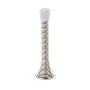Metal spring door stopper detail view, flexible coiled structure with white rubber tip.