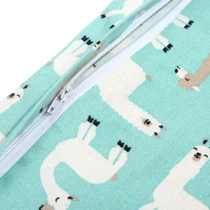 Baby hanging diaper storage bag detail view, mint green fabric with cute alpaca print.