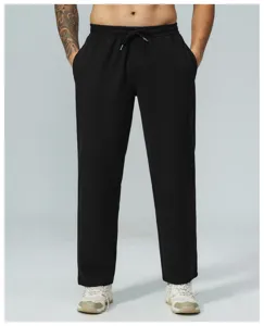 Pantaloni casual neri da uomo in tessuto waffle, comodo girovita elastico con coulisse, taglio.