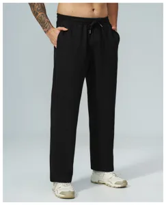 Pantaloni casual da uomo neri in maglia waffle, comodi pantaloni dritti per sport.