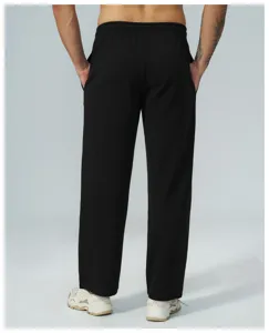 Pantaloni casual neri in maglia waffle da uomo vista posteriore, vestibilità comoda
