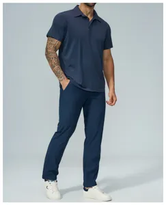 Men's casual short sleeve polo shirt and trousers outfit detail view in stylish dark blue color.
