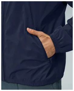 Close-up view of the zipper pocket detail and fabric texture on a mens dark blue casual jacket.