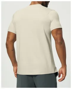 Back detail view of men's casual short sleeve t-shirt in beige, breathable fabric style.
