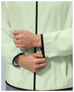 Close-up detail of lightweight outdoor jacket cuff zipper and contrast trim design.