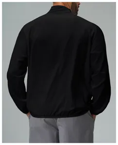 Back view detail of lightweight black men's outdoor sun protection sports jacket, breathable.