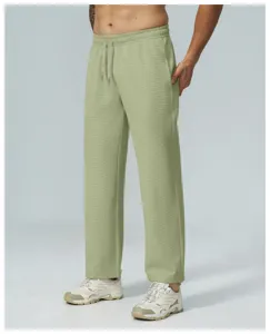 Pantaloni casual da uomo verde chiaro in tessuto waffle con coulisse per escursionismo.