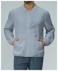Men casual stand collar zip jacket detail view showing lightweight fabric and cuffs.