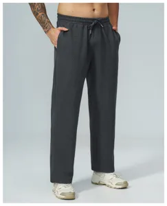 Vista dettagliata dei pantaloni casual in maglia waffle grigio scuro, consistenza con coulisse