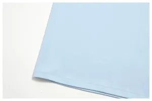 Light blue casual men's short sleeve t-shirt hem detail and soft fabric close up